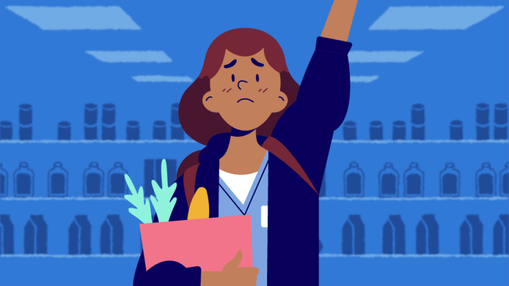 med student raising hand embarrassed holding groceries 